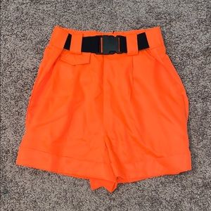 Neon orange buckle front high waisted shorts